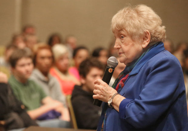Holocaust survivor Eva Mozes Kor speaks to 8th graders at Valparaiso High School's auditorium.